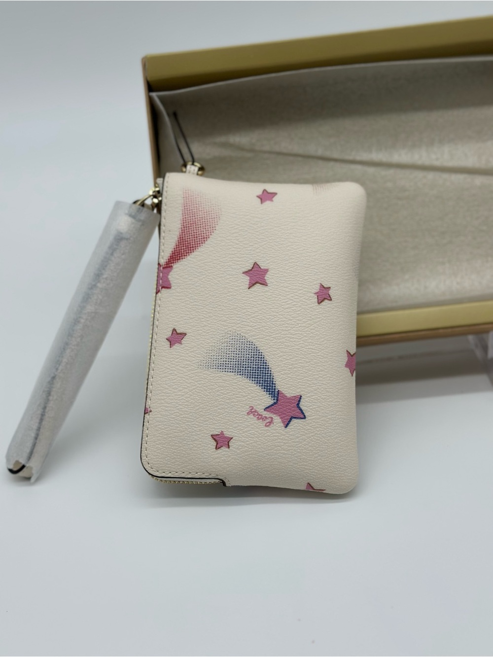 Coach White Wristlet with Pink Star Motif and Gold Charm - Picture 4 of 7